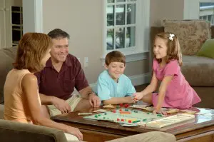 Family Playing Monopoly