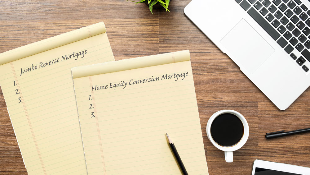 Notepads on desk ready to compare Jumbo Reverse Mortgage and HECMs